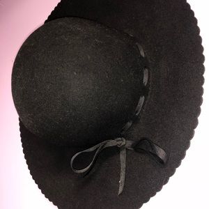 Black felt ladies hat with option to adjust size